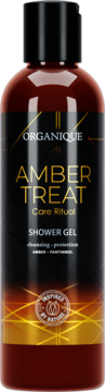 Organique Amber Treat Żel pod prysznic, bursztynowa butelka z czarną etykietą i złotym napisem, widok z przodu.