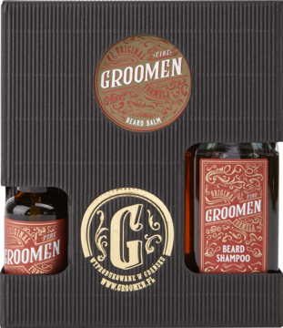 Zestaw do brody GrooMen z szamponem i balsamem w eleganckim czarnym pudełku ze złotymi detalami. Widok z góry.