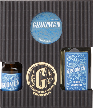 Zestaw do brody Groomen AQUA w czarnym pudełku: szampon, balsam i olejek z niebieskimi grafikami. Widok z góry.