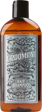 Groomen męski szampon do włosów w bursztynowej butelce z czarnym korkiem, z przodu srebrna etykieta „Hair Shampoo”.