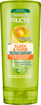Garnier Fructis Sleek & Shine Conditioner z arganem i keratyną, do włosów puszących się, w zielonej butelce z recyklingu.