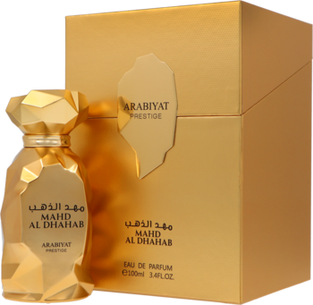 Złota, fasetowana butelka wody perfumowanej Arabiyat Prestige Mahd Al Dhahab 100ml przed złotym pudełkiem.