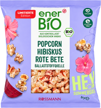 Fioletowa torebka EnerBiO Limited Edition Popcorn Hibiskus Rote Bete. Widoczny różowy popcorn, certyfikaty Vegan i BIO.