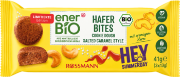 EnerBiO Hafer Bites Cookie Dough Salted Caramel, żółte opakowanie, widok z przodu, z ciasteczkami i nerkowcami.