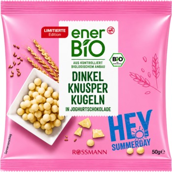 Widok z przodu różowego opakowania Ener Bio Dinkel Knusper Kugeln, chrupek orkiszowych w jogurtowej czekoladzie.