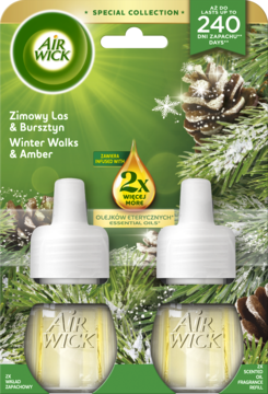 Air Wick Winter Walks & Amber scented oil refills, podwójne opakowanie z zielonym tłem i sosnowymi gałęziami.