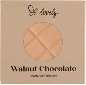 Lovely Walnut Chocolate matte face bronzer w beżowym kompakcie, z bliska, okrągły puder z reliefową teksturą.