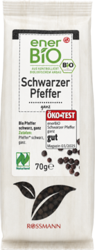 Białe opakowanie enerBiO Schwarzer Pfeffer ganz 70g (BIO czarny pieprz ziarnisty), widok z przodu, z logo i ziarenkami.