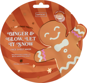 Maseczka Sence Christmas Cookie Ginger & Glow na twarz, okrągła, z uśmiechniętym piernikiem i gwiazdkami.