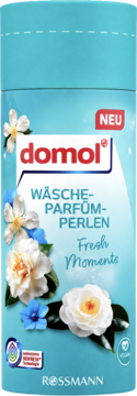 Domol Wäsche-Parfüm-Perlen Fresh Moments w turkusowym pojemniku z białymi kwiatami, widok z przodu. Rossmann.
