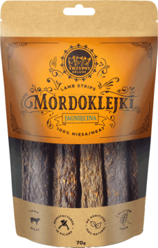 TRZYPSY DELUXE Mordoklejki jagnięce gryzaki 70g. Brązowa torebka ze złotymi detalami, widoczne paski mięsne dla psa.