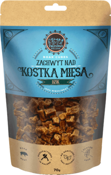 TRZYPSY DELUXE Zachwyt Nad Kostką Mięsa Dzik 70g, przysmak w beżowo-niebieskiej torebce z kostkami.