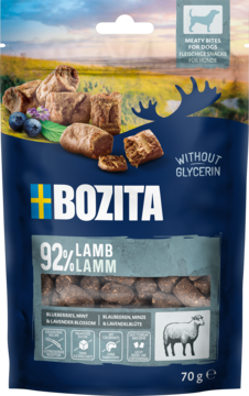Bozita przysmaki dla psa jagnięcina 70g, niebieska torebka z napisem 92% LAMB, widoczne smakołyki.