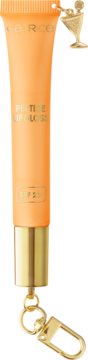 Catrice Peptide Lipgloss SPF 25 w brzoskwiniowej tubce, złotą nakrętką i zawieszką w kształcie kieliszka.