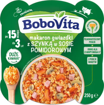 Zielone opakowanie BoboVita: makaron gwiazdki z szynką w sosie pomidorowym dla dzieci 15m+, z dużymi kawałkami i Omega 3. Widok z góry.