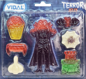Vidal Terror Jelly, kolorowy zestaw żelków w blistrze: wampir, mózg, zęby, czosnek, nagrobek. Widok z przodu.