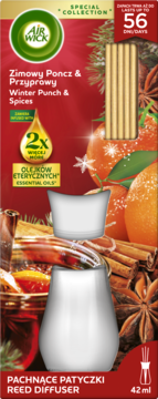 Air Wick Reed Diffuser Winter Punch & Spices, czerwone opakowanie z cytrusami i przyprawami, biały dyfuzor.