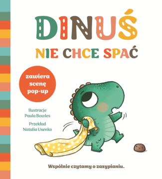 Okładka książki "Dinuś nie chce spać": zielony dinozaur z żółtym kocykiem, zawiera scenę pop-up, o zasypianiu.