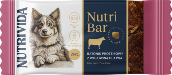 Front opakowania: Baton Proteinowy Nutri Bar z wołowiną dla psa. Biały z psem, niebieski z krową i tekstem.