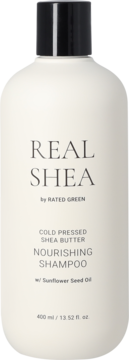 Biała butelka szamponu Rated Green Real Shea Nourishing z czarnym korkiem, masłem shea i olejem słonecznikowym, przód.