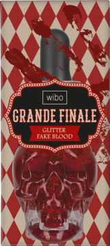 Wibo Grande Finale Glitter Fake Blood w butelce w kształcie czaszki, wypełnionej czerwoną brokatową krwią, na tle rombów.