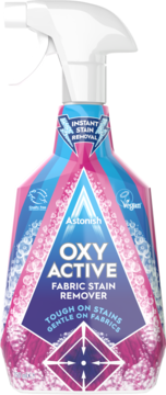 Astonish Oxy Active Fabric Stain Remover spray, pink and blue bottle with white trigger, full front view. "Instant Stain Removal" text.