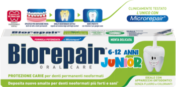 Biorepair Junior 6-12 lat pasta do zębów z Microrepair, bez fluoru, front biało-zielonego opakowania.