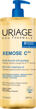 Uriage Xemose C8+ olejek myjący 1L do skóry suchej i atopowej, z ceramidami, żółta butelka z niebieską pompką, przód.