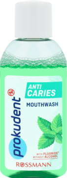 Prokudent Anti Caries Mouthwash, zielony płyn w butelce z białą nakrętką, widok z przodu. Zawiera fluor, bez alkoholu.