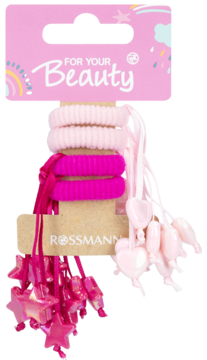 Różowe i białe gumki do włosów Joy z ozdobami w kształcie serc i gwiazd, na opakowaniu Rossmann.