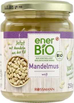 enerBiO Mandelmus Rossmann, biały mus z blanszowanych migdałów, w szklanym słoiku, widok z przodu.