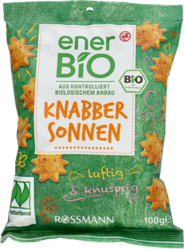 Zielone opakowanie enerBiO Krakersy słoneczka BIO 100g Rossmann, z wizerunkami wesołych słoneczek.