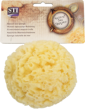Duża, jasnożółta naturalna gąbka morska typu Grass w opakowaniu, delikatna do pielęgnacji skóry wrażliwej.