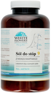 Brązowa butelka White Flower's Experience soli do stóp z Morza Martwego, z olejem czarnuszki i jojoba.
