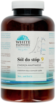 Brązowa butelka White Flower's Experience soli do stóp z Morza Martwego, z olejem czarnuszki i jojoba.