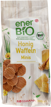 Białe opakowanie enerBiO Honig Waffeln Minis z okrągłymi chrupiącymi waflami miodowymi, widok z przodu.