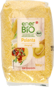 Ekologiczna polenta kukurydziana enerBiO 500g w przezroczystej torebce z żółtymi ziarnami, widok z przodu.