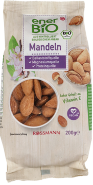 Biała torba enerBiO Migdały z Rossmanna, 200g, z przezroczystym oknem i etykietami bio/vegan, widok z przodu.