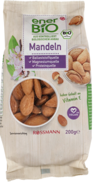 Biała torba enerBiO Migdały z Rossmanna, 200g, z przezroczystym oknem i etykietami bio/vegan, widok z przodu.