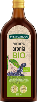 Ciemnobrązowa butelka soku Premium Rosa 100% aronia BIO 500ml, etykieta z owocami i zielonym tłem, widok z przodu.