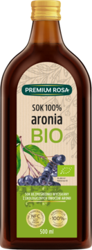 Ciemnobrązowa butelka soku Premium Rosa 100% aronia BIO 500ml, etykieta z owocami i zielonym tłem, widok z przodu.