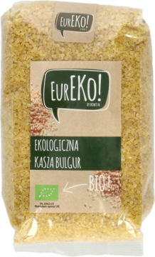 Przezroczysta torba Eureko! z ekologiczną kaszą bulgur, widoczna złota tekstura ziaren i brązowa etykieta.
