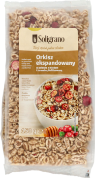 Soligrano Orkisz ekspandowany z miodem i żurawiną, przezroczysta torebka, widok z przodu, widoczne ziarna.