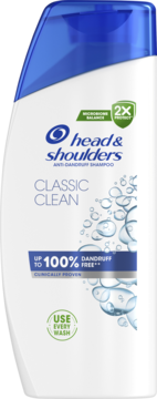 Szampon Head & Shoulders Classic Clean, biała butelka z niebieskim korkiem, widok z przodu, z hasłem 100% DANDRUFF FREE.