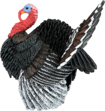 Figurka indyka z rozłożonym ogonem, ciemne upierzenie, czerwona głowa z niebieskimi detalami, widok z boku.