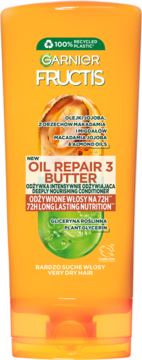 Garnier Fructis Oil Repair 3 Butter, intensywnie odżywcza odżywka w pomarańczowej butelce, przód z zielonym akcentem, dla bardzo suchych włosów.