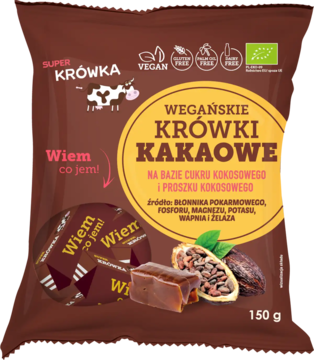 Ciemnobrązowa torba Super Krówka Wegańskie Krówki Kakaowe, z widocznymi cukierkami i kakao. Produkt Vegan, BIO.