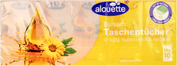 Żółte opakowanie chusteczek Alouette Balsam, 4-warstwowe, z grafiką oleju słonecznikowego i kwiatu, widok przód.