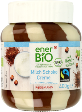 Słoik enerBio Krem mleczno-czekoladowy z orzechami laskowymi, z biało-brązowymi pasami, widok z przodu.