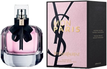 Yves Saint Laurent Mon Paris EDP, różowy flakon z czarną kokardką i kryształową podstawą obok pudełka YSL.